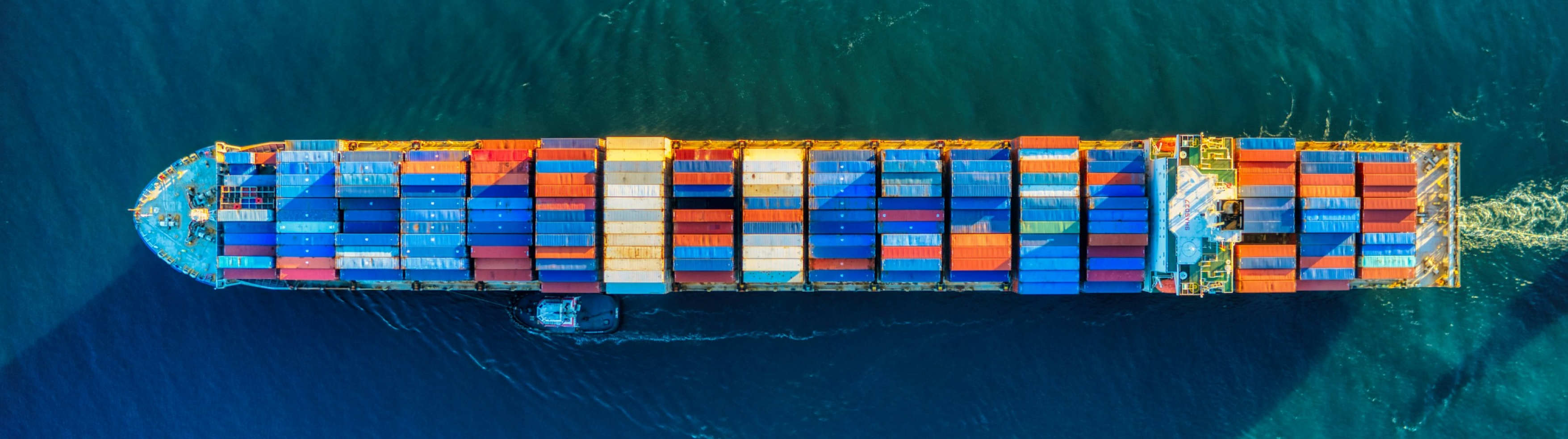 A cargo ship with lots of containers